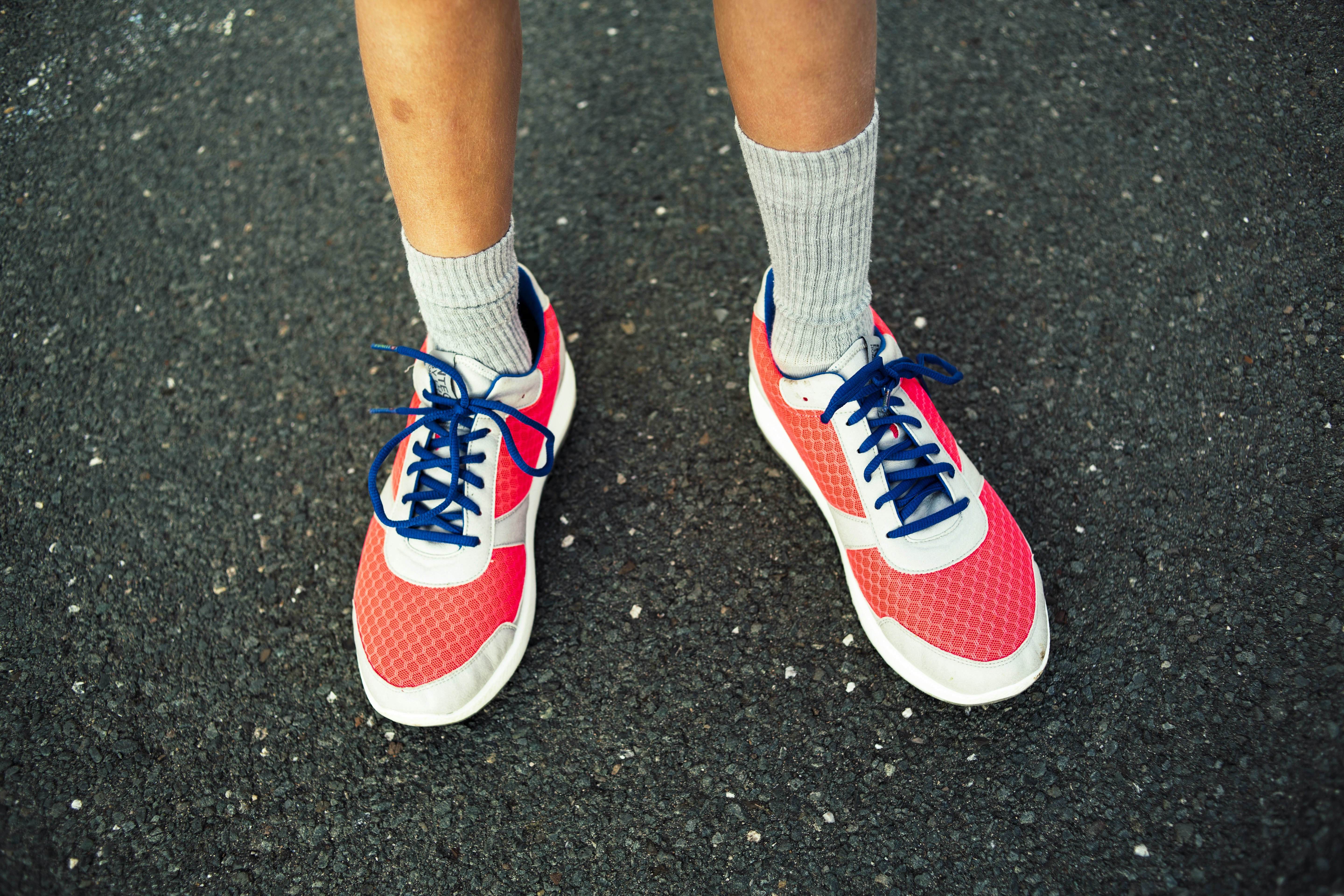 red-and-white running shoes